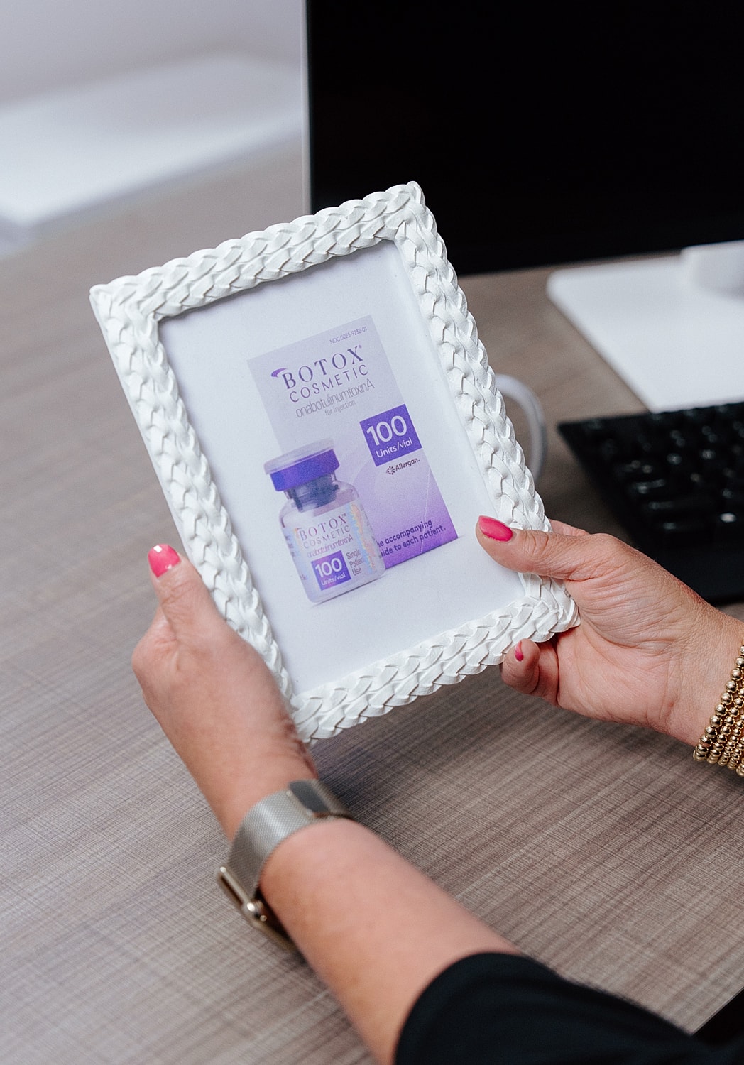 Botox Cosmetic packaging in a decorative frame.